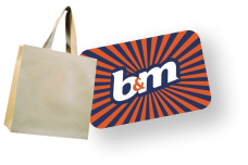 A shopping bag next to a B&M gift card.
